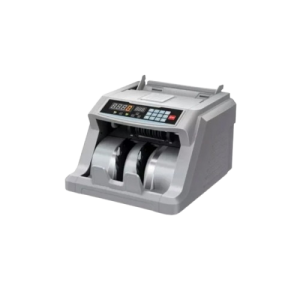Zenith Bill Counter machine in use on an office desk, counting naira notes quickly.