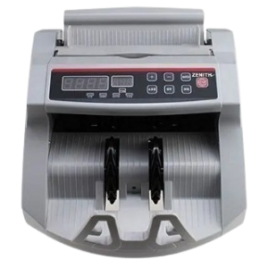 Zenith Bill Counter machine in use on an office desk, counting naira notes quickly.